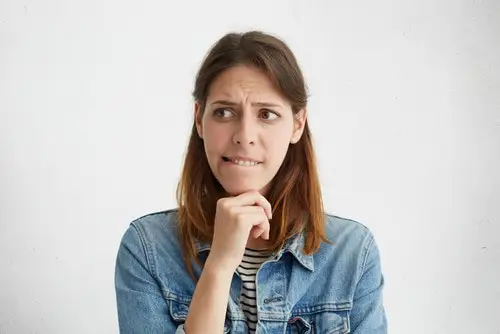 woman biting her lip